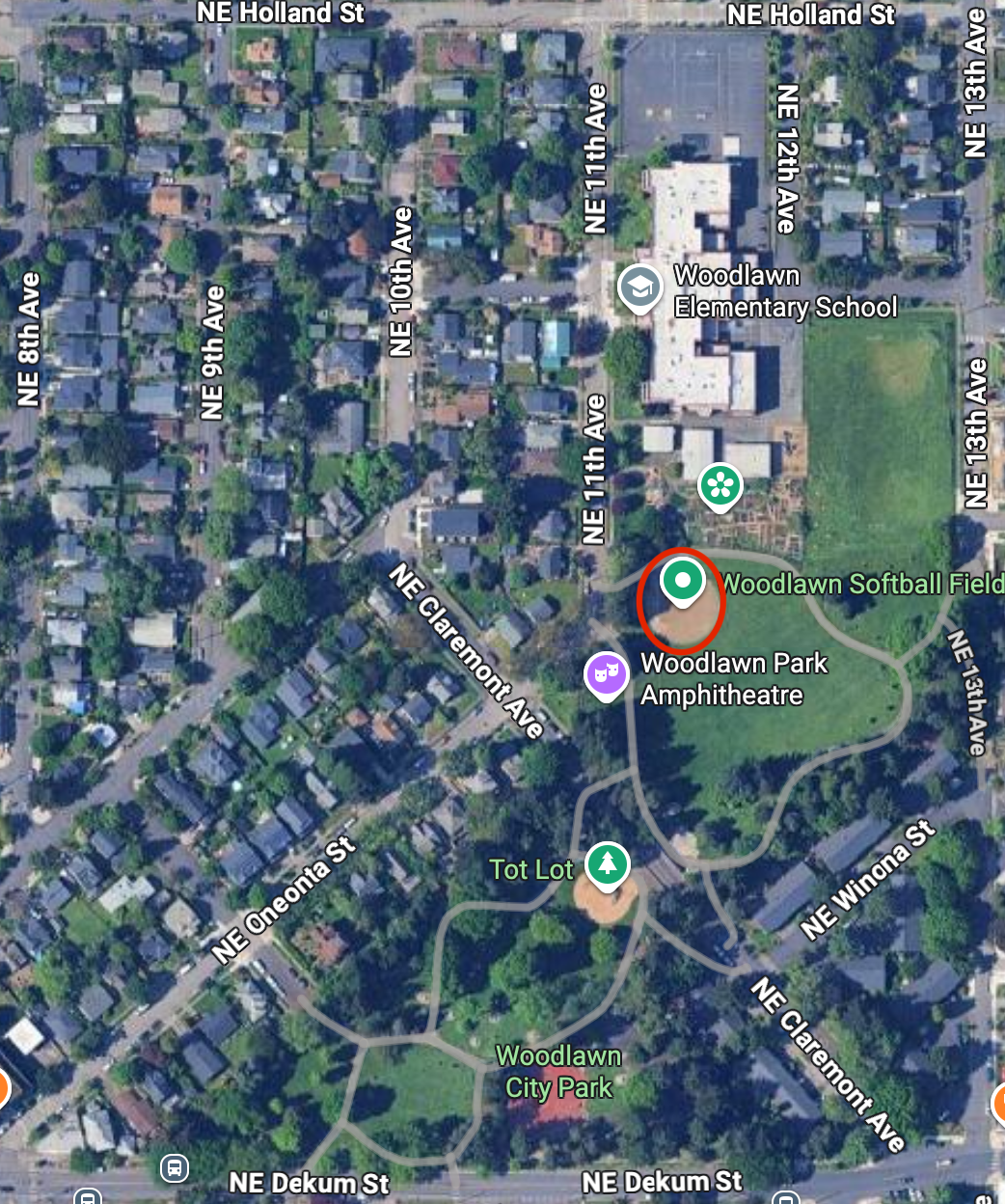 Aerial map of Woodlawn Park with the softball field circled in red, near NE 11th Ave and NE Claremont